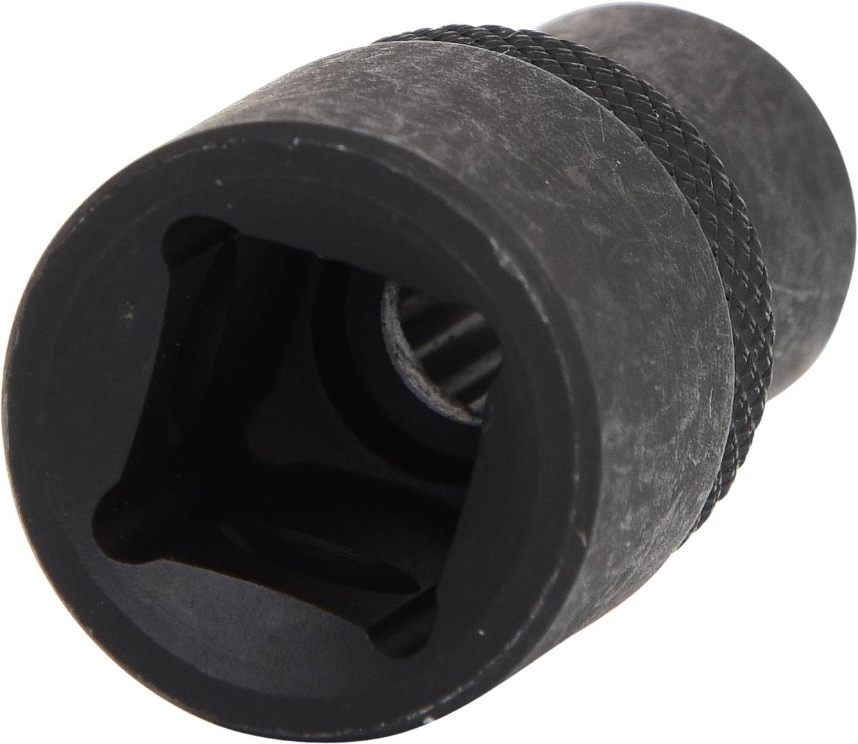 Ciemnoszary sworzeń z karbowaną krawędzią. Posiada kwadratowy otwór i jest typowo stosowany do prac związanych z wkręcaniem.