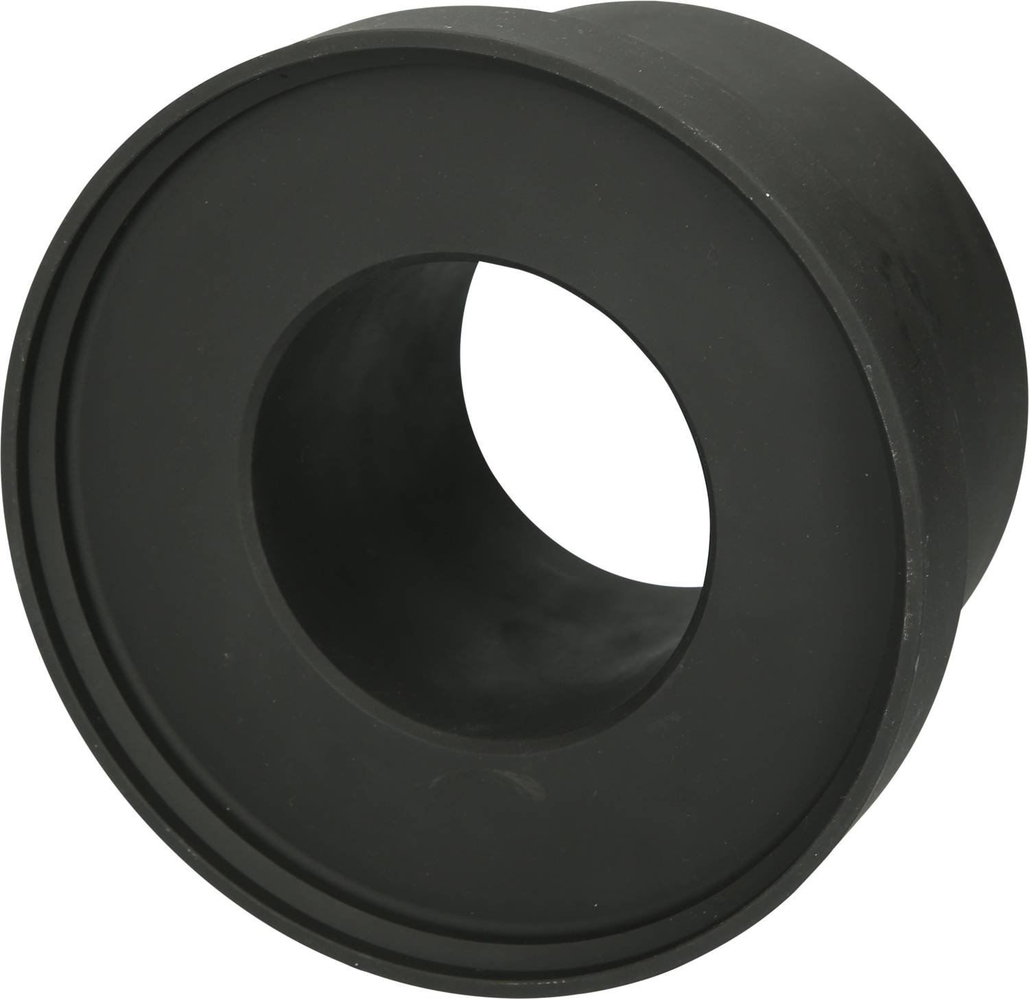 Czarny, cylindryczny element gumowy z dużym otworem centralnym, prawdopodobnie pierścień uszczelniający lub część elementu maszyny.
