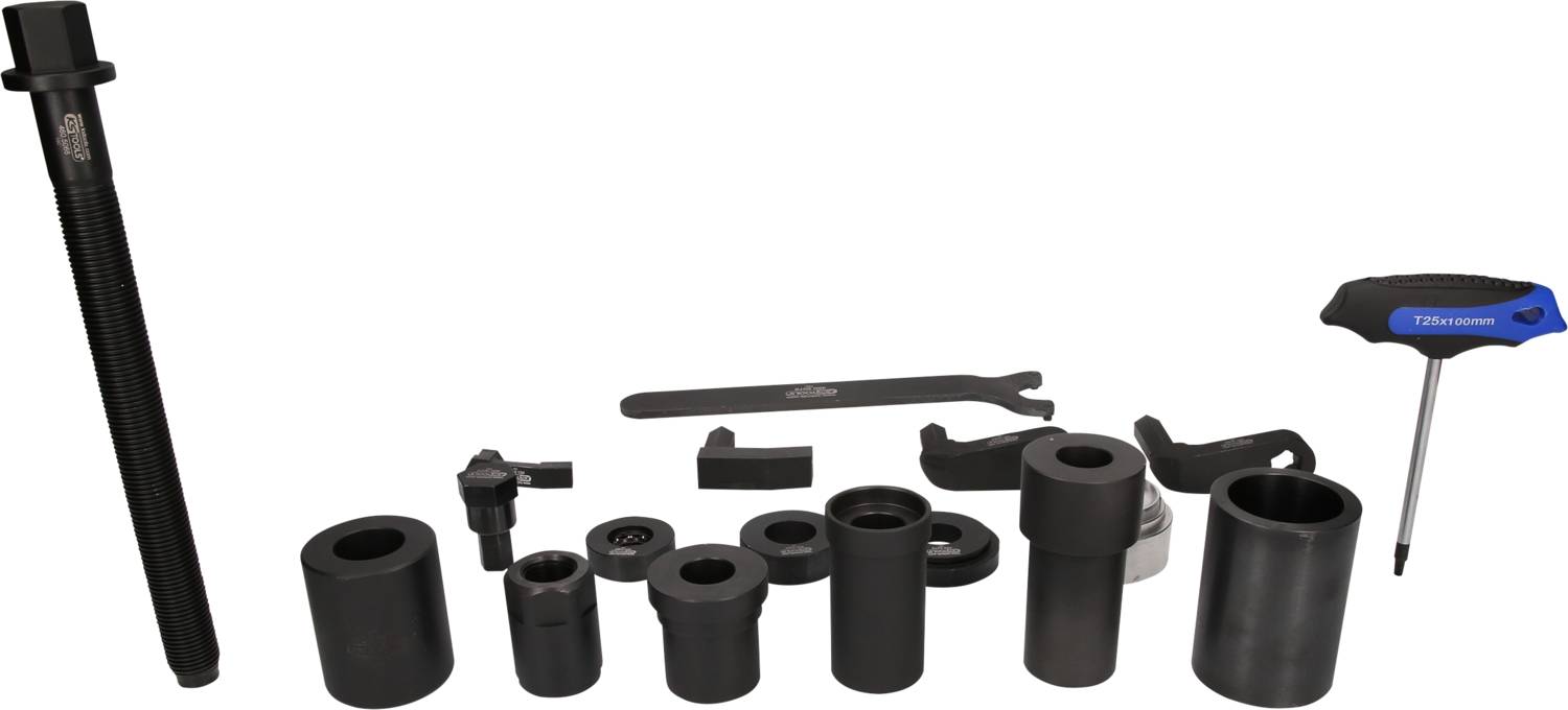 Zestaw narzędzi mechanika składający się z różnych czarnych metalowych cylindrów i nakrętek, z wkrętakiem z uchwytem T oraz kluczem do śrub.