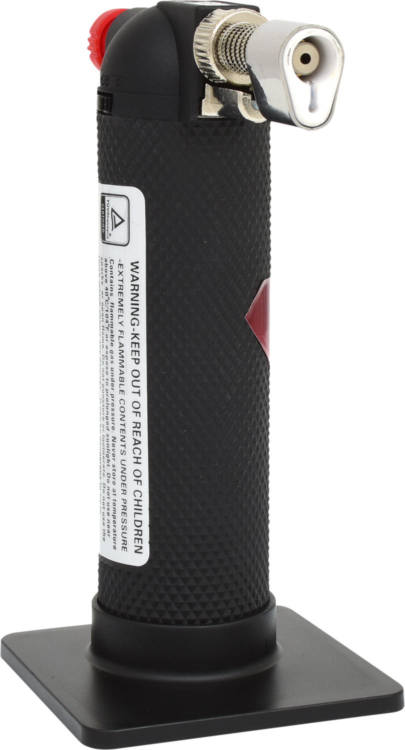 Czarny palnik Bunsena z czerwonym przyciskiem zapłonowym i ostrzeżeniem bezpieczeństwa 'WARNING: KEEP OUT OF REACH OF CHILDREN'