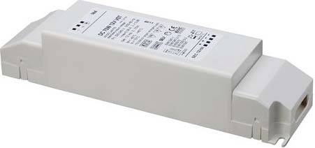 Prostokątne urządzenie elektroniczne z oznaczeniami, złączami i wskaźnikami; prawdopodobnie sterownik LED lub transformator.