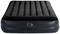 Dmuchany materac w ciemnoniebiesko-czarnym kolorze z wbudowaną pompką elektryczną, nadający się do spania lub jako łóżko dla gości.
