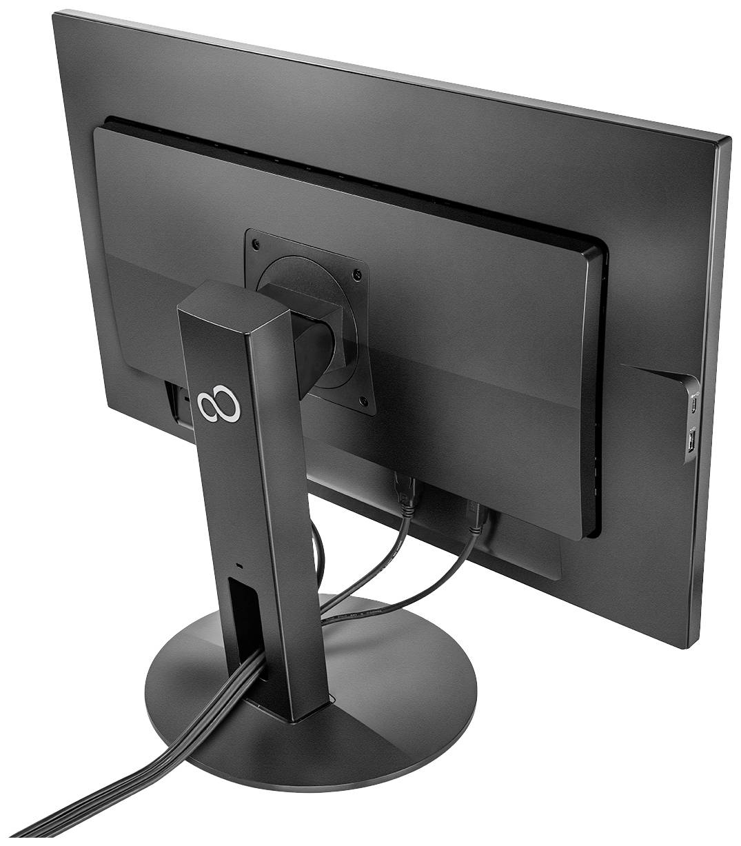 Czarny monitor komputerowy widziany od tyłu, zamocowany na podstawce, z widocznymi złączami kabli i logo firmy na podstawie.