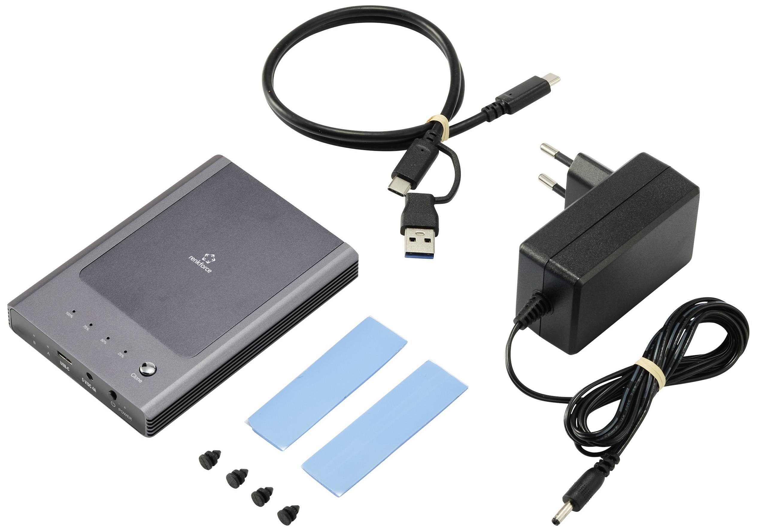 Zewnętrzna obudowa dysku twardego z przewodem USB i sieciowym, zasilaczem, podkładkami termoprzewodzącymi oraz śrubami do montażu i chłodzenia dysku twardego.