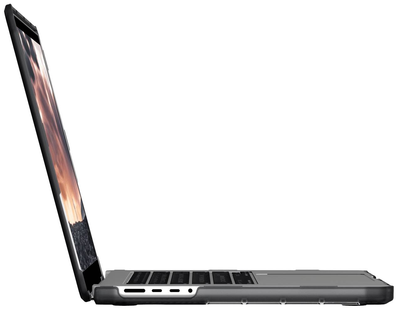 Laptop widziany z profilu, lekko uchylony, prezentuje ekran z zachodem słońca. Ostrość skierowana jest na boczne klawisze i złącza.