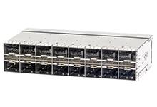 Kilka srebrnych urządzeń elektronicznych ułożonych w stos w szafce rack, prawdopodobnie urządzenia sieciowe lub serwery, ustawione w rzędzie.