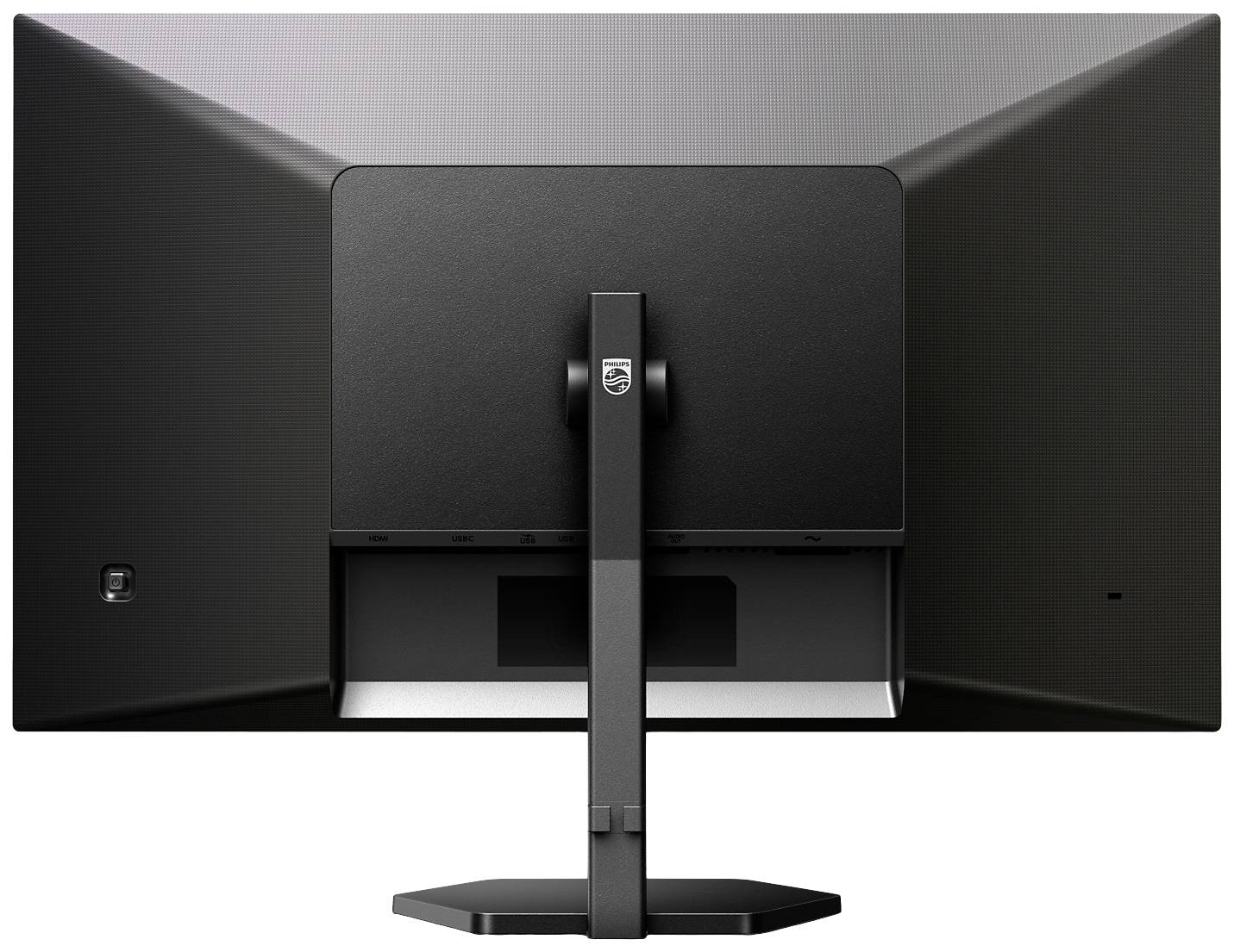 Czarny monitor komputerowy widziany od tyłu, ukazujący podstawę i tylną część ekranu.