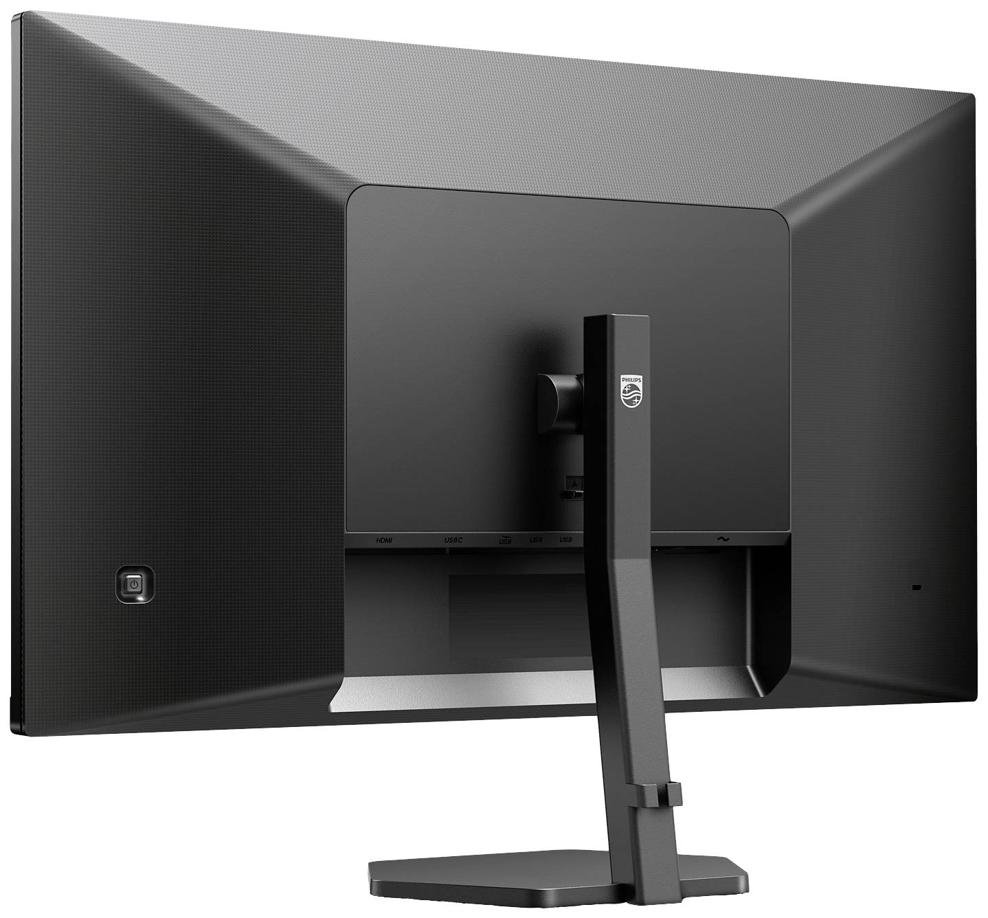 Czarny monitor komputerowy widziany od tyłu, z solidną podstawą i smukłą, nowoczesną stylistyką.