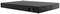 Płaskie, czarne urządzenie elektroniczne, prawdopodobnie serwer lub router, z otworami wentylacyjnymi i gniazdem zasilania z tyłu.