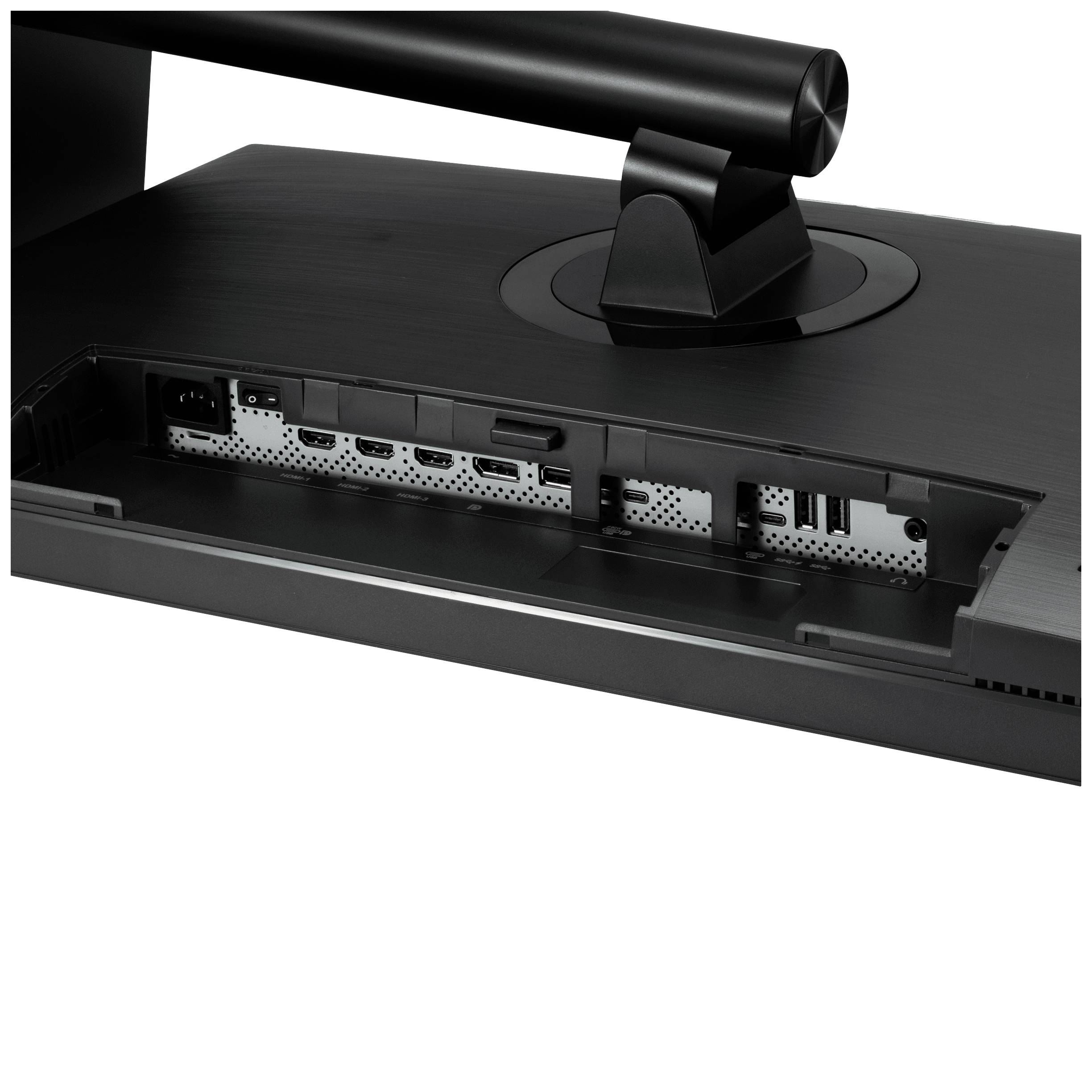 Tylna strona monitora komputerowego z różnymi złączami, w tym HDMI i USB, pod zdejmowalną pokrywą.