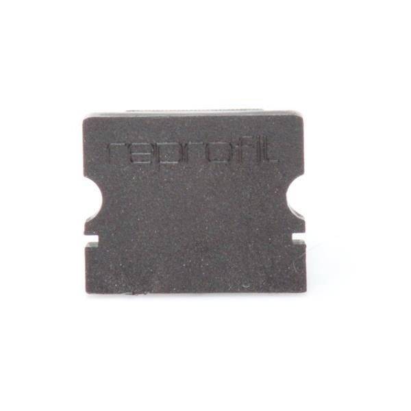 Prostokątny przedmiot z wygrawerowanym słowem 'reprofit'.