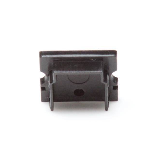 Czarny element plastikowy o prostokątnym kształcie z dwoma wtryśniętymi listwami mocującymi po bokach, służący do mocowania.