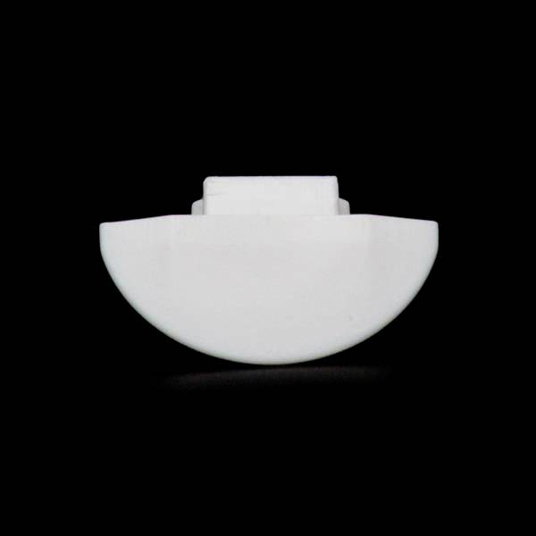 Biały, półkolisty obiekt na czarnym tle.