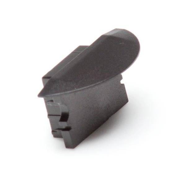 Czarny plastikowy klin, który może być używany jako element dystansowy lub do mocowania części.