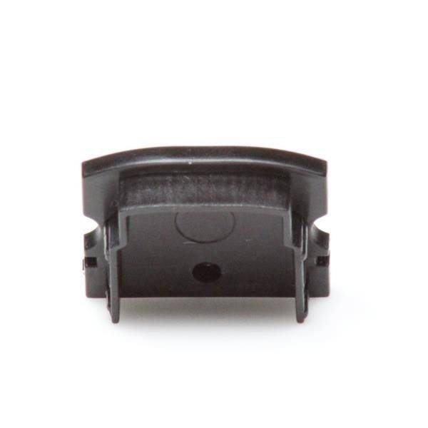 Czarna plastikowa część o wygiętej górnej powierzchni i bocznych mocowaniach, prawdopodobnie element lub akcesorium do jakiegoś urządzenia.