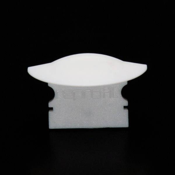 Biała żyletka z owalnym plastikowym uchwytem na czarnym tle. Na ostrzu widnieje napis 'nerofil'.