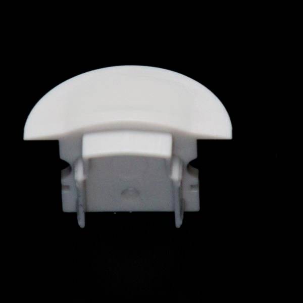 Biała, półokrągła osłona z tworzywa sztucznego z dwoma uchwytami, na czarnym tle.