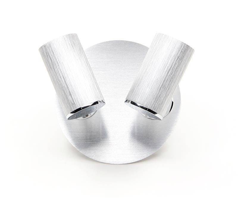 Dwie regulowane, cylindryczne lampy LED na okrągłej, metaliczno-srebrnej podstawie, idealne do nowoczesnych wnętrz.