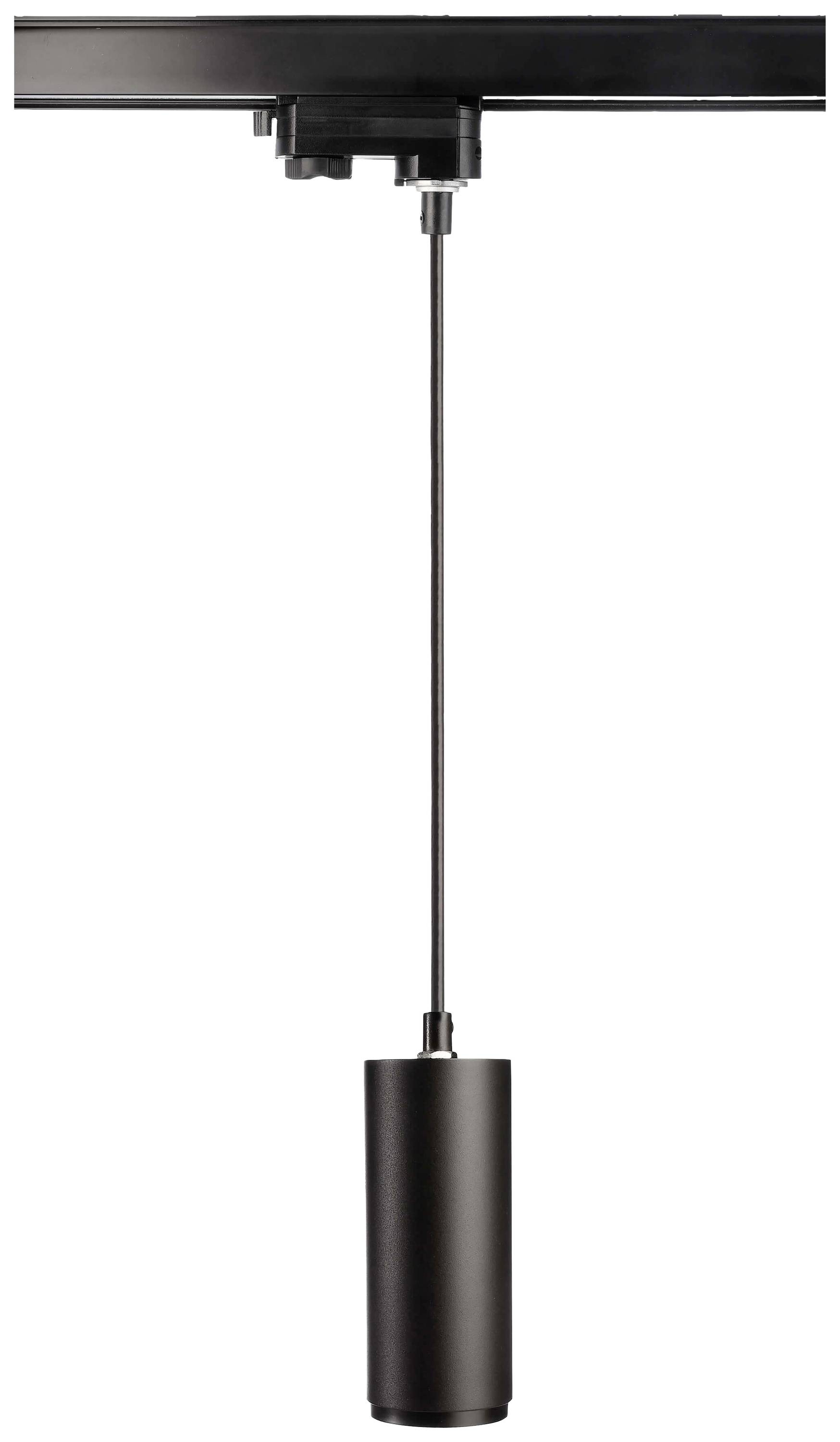 Czarna, cylindryczna lampa wisząca zwiesza się z ciemnej szyny.
