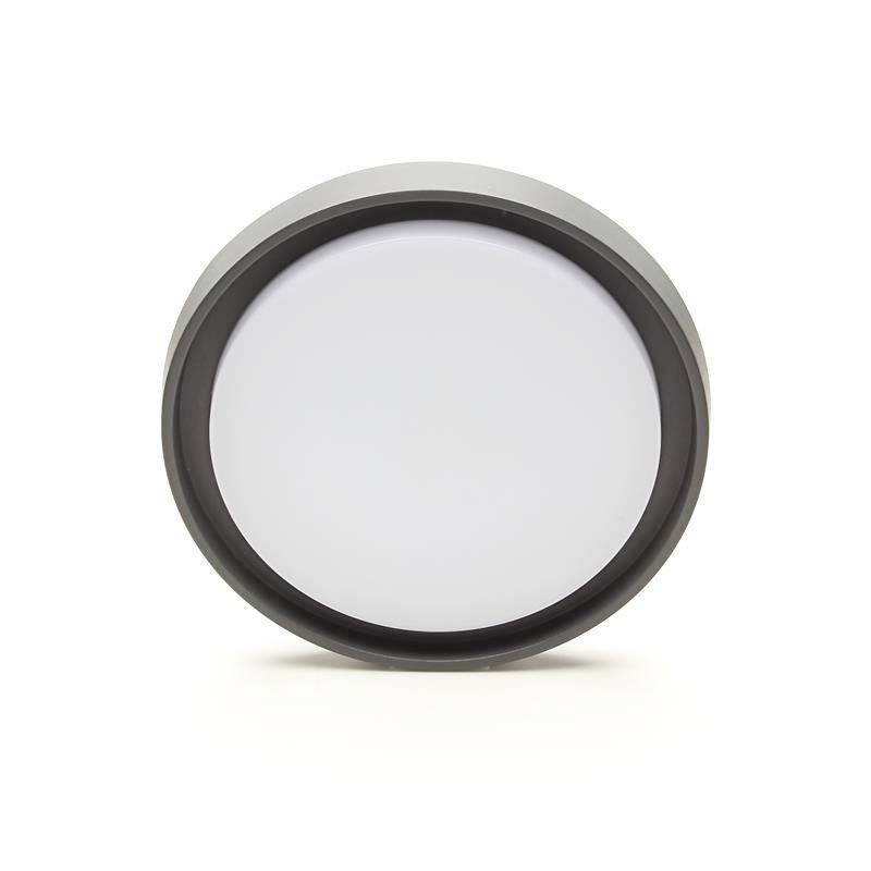 Okrągły biały kinkiet z czarną obwódką. Minimalistyczny design, idealny do nowoczesnych wnętrz.