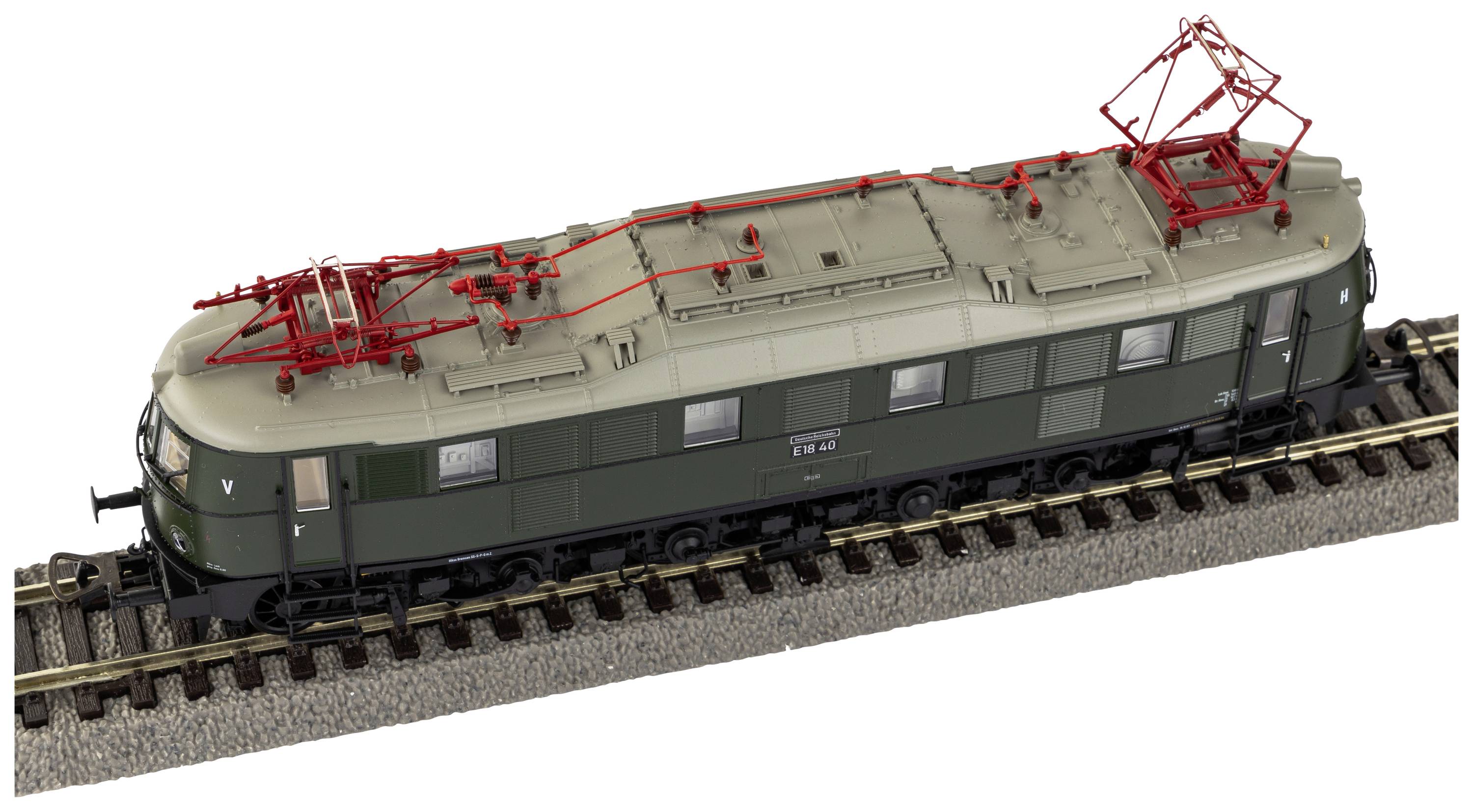 Czarna modelowa lokomotywa elektryczna z czerwonym pantografem na torach kolejowych. Szczegółowy projekt, stylizowany dla kolekcjonerów.