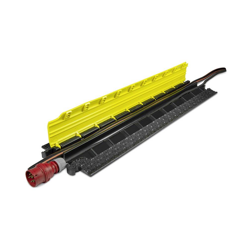 Żółty plastikowy kanał ochronny, na którym spoczywa czerwony kabel. Służy on ochronie przewodów w mocno uczęszczanych obszarach.