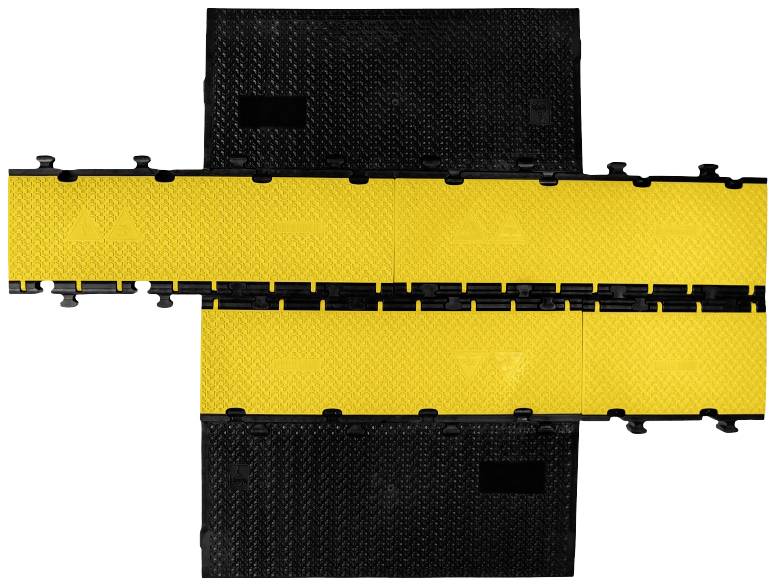 Kładka kablowa z żółtymi płytami osłonowymi przebiegająca przez skrzyżowanie na czarnym tle. Zwiększa bezpieczeństwo poprzez organizację przewodów.