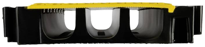 Czarny słupek gumowy z żółtą górną częścią, używany do uspokojenia ruchu lub jako przeszkoda na drogach i parkingach.