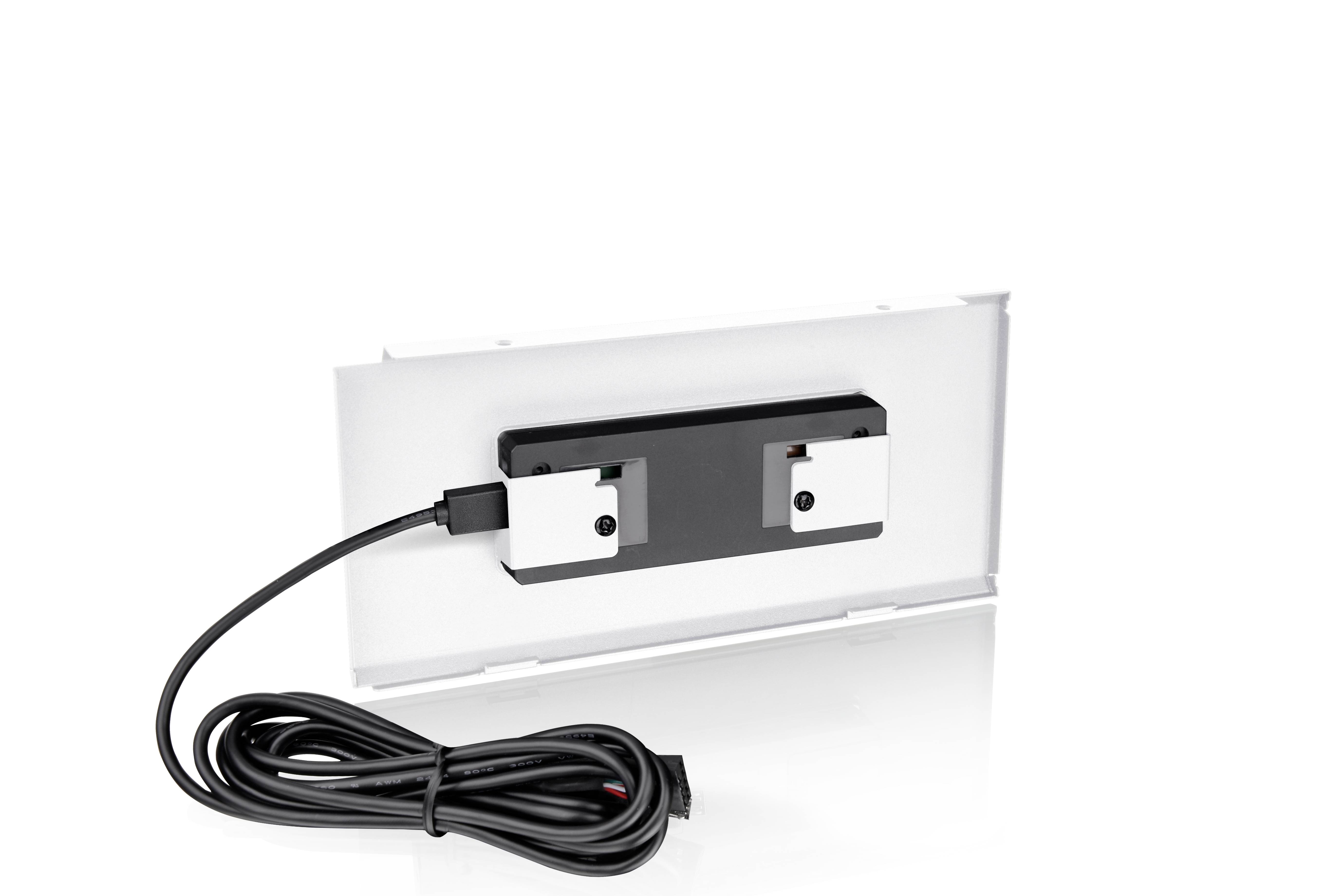 Prostokątne urządzenie elektroniczne z czarną tylną ścianką i przewodem używanym do podłączenia lub zasilania.