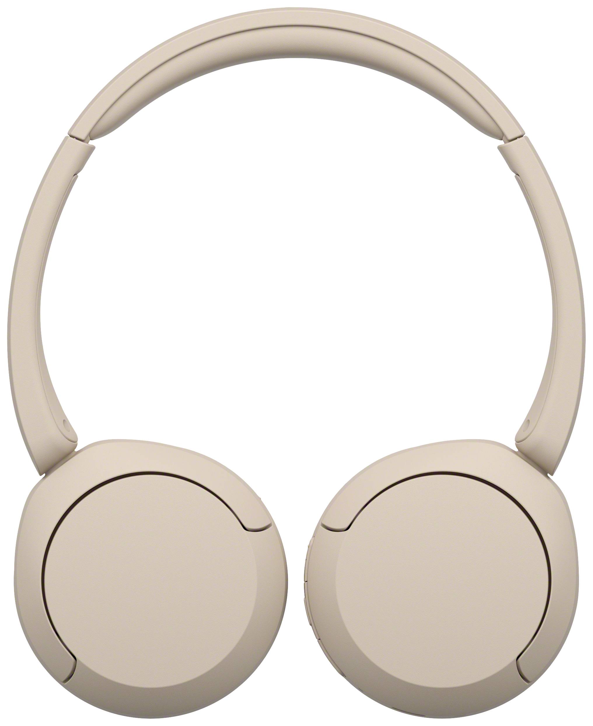 Zagięte, nauszne słuchawki w kolorze beżowym, prezentujące minimalistyczny, elegancki design. Niezbędne do słuchania muzyki lub prowadzenia rozmów.
