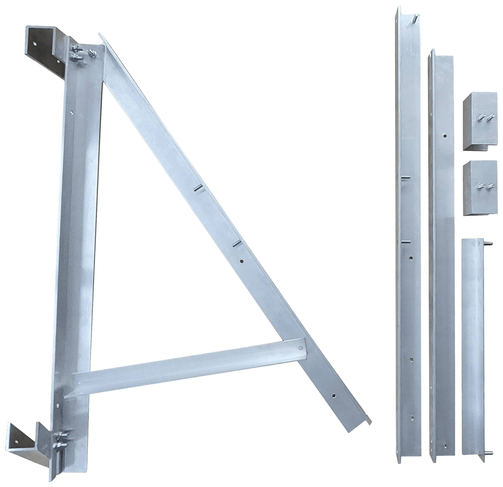 Metalowy kąt i pozostałe elementy metalowe leżą ułożone na jasnym tle. Wydają się być częścią zestawu montażowego.