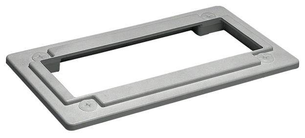 Szary, prostokątny uchwyt plastikowy o zaokrąglonych narożnikach z wycięciem pośrodku, przeznaczony do mocowania lub jako element podtrzymujący.
