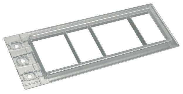 Rama z tworzywa sztucznego z czterema prostokątnymi wycięciami i trzema otworami mocującymi po lewej stronie.