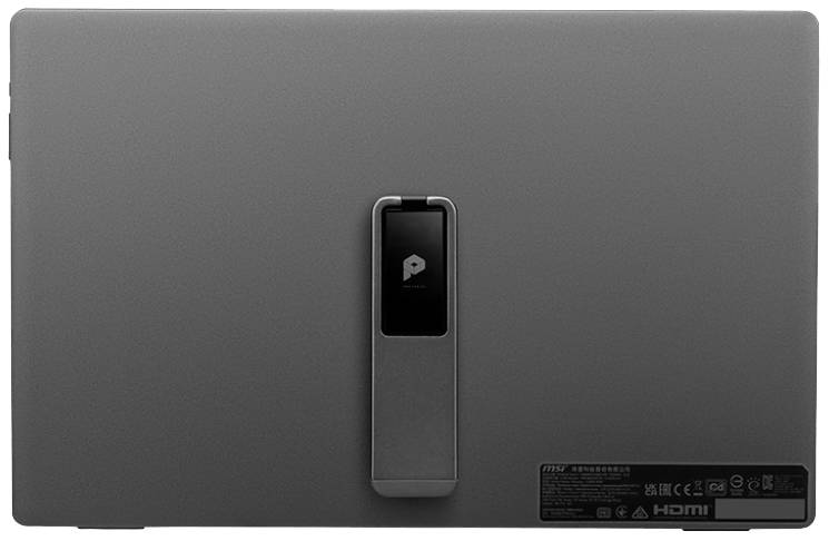 Szary elektroniczny sprzęt widziany od tyłu, z charakterystycznym logo pośrodku oraz złączem HDMI w dolnym prawym rogu.