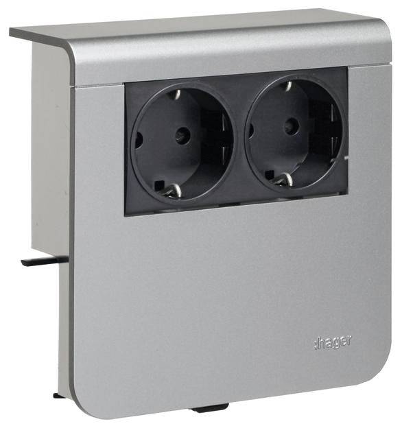 'Podwójne gniazdo elektryczne w srebrnej obudowie, nadające się do montażu ściennego. Nazwa marki widoczna od spodu. Nowoczesny design.'