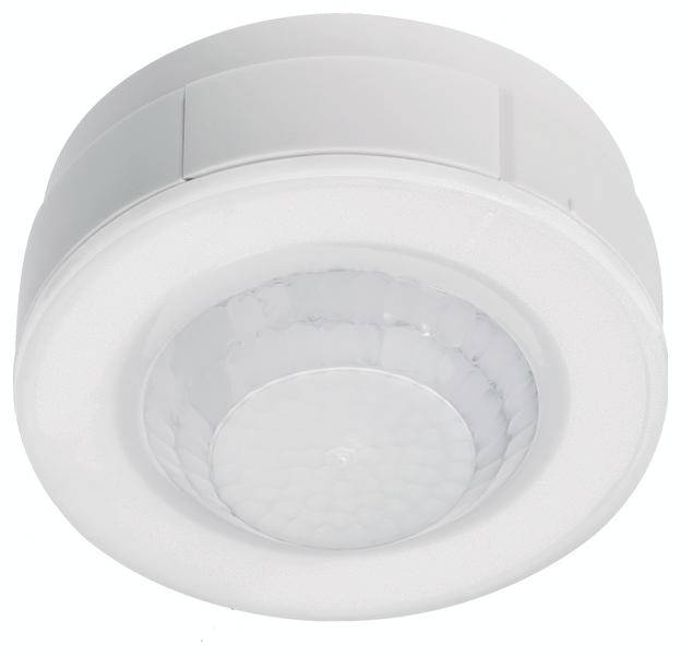 Biały, okrągły czujnik ruchu o strukturyzowanej powierzchni pośrodku, przeznaczony do montażu sufitowego we wnętrzach.