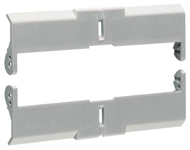 Rysunek przedstawia dwie szare części plastikowe o prostokątnym kształcie, ułożone jedna na drugiej.