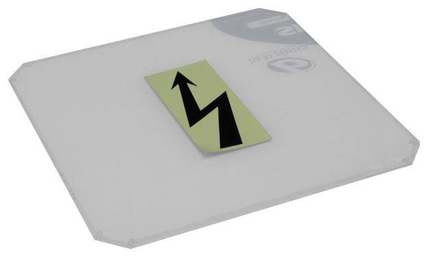 Prostokątna, przezroczysta tarcza plastikowa z ukośną, czarną strzałką błyskawicy na żółtym tle.