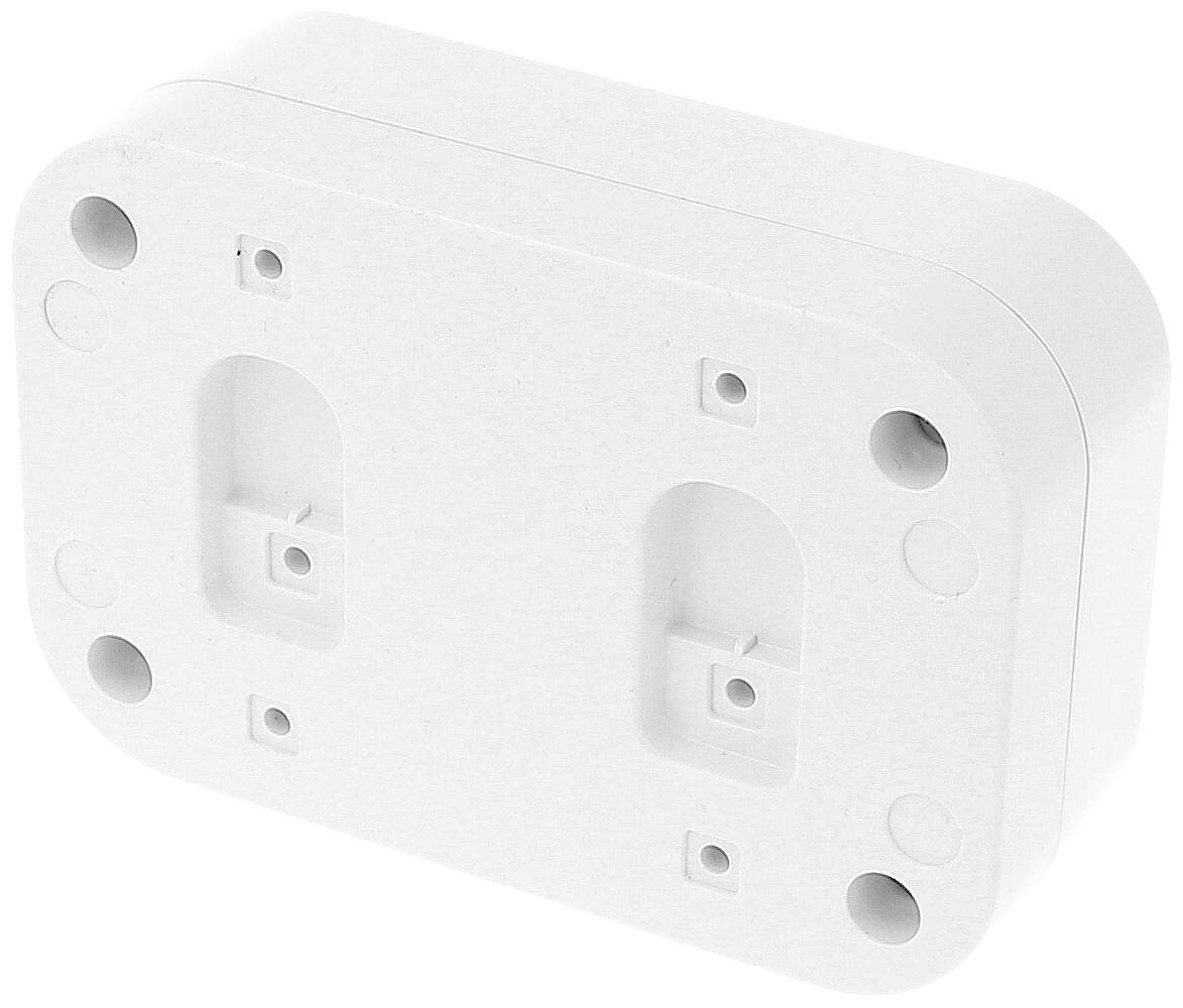 Biała, prostokątna plastikowa wspornik z zaokrąglonymi krawędziami, z wieloma otworami na śruby i wycięciami do celów montażowych.