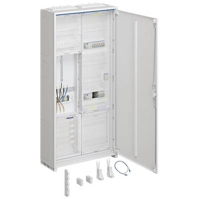 Otwarty rozdzielnik elektryczny z wieloma przewodami i elementami elektrycznymi. Obok leżą różne drobne części i przewód.