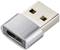 Adapter USB z metalową obudową, wtyk USB-A na gniazdo USB-C. Służy do łączenia urządzeń z różnymi złączami.