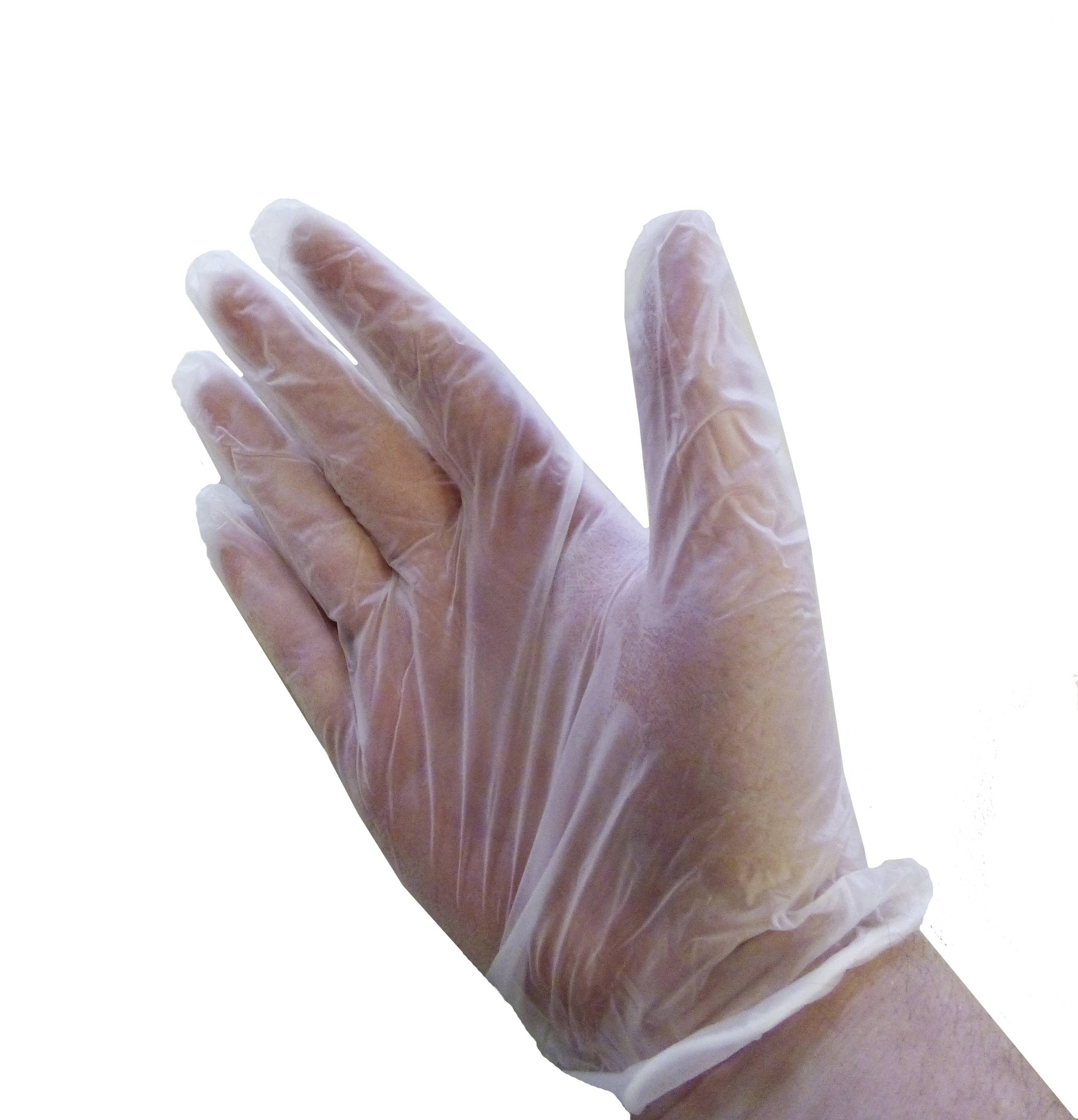 Widać dłoń w przezroczystej jednorazowej rękawiczce, z rozstawionymi palcami.