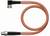 Pomarańczowy, skręcony przewód z czarną wtyczką na każdym końcu, odpowiedni do elektronarzędzi lub urządzeń.