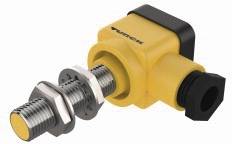 Żółty czujnik indukcyjny z gwintem metalowym i elementami mocującymi. Idealny do precyzyjnego wykrywania obiektów metalowych w zastosowaniach przemysłowych.