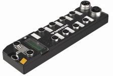 Elektroniczny moduł z wieloma portami przyłączeniowymi i wyświetlaczem na górnej powierzchni, najczęściej stosowany w połączeniach przemysłowych.