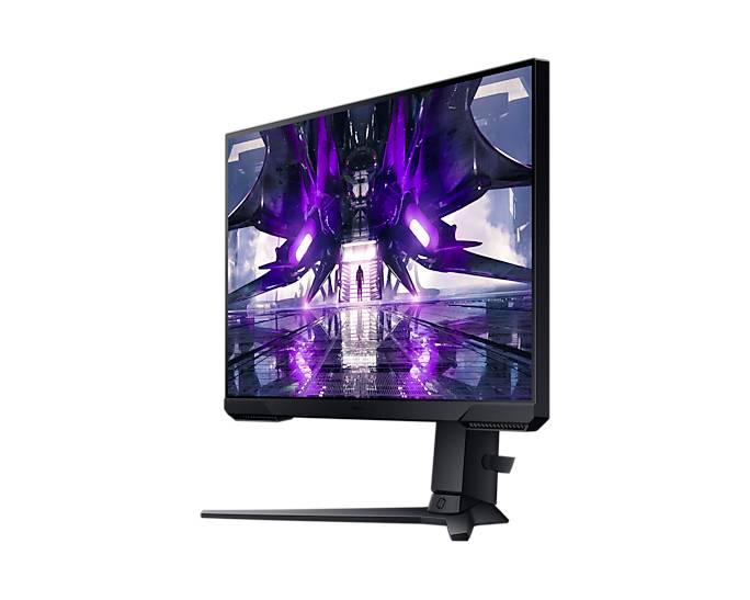 Monitor wyświetla futurystyczną scenę z fioletowymi światłami i lustrzaną powierzchnią, tworząc atmosferę zaawansowanej technologicznie.