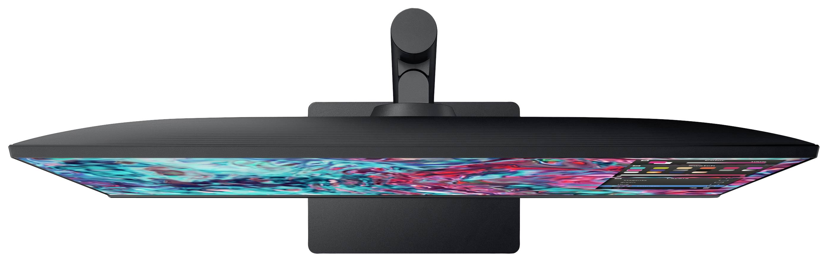 Płaski monitor komputerowy z żywym, kolorowym wzorem na ekranie, widziany z góry.