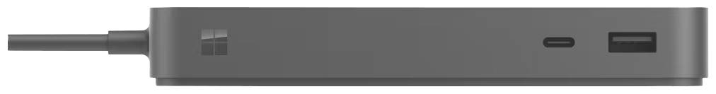 Prostokątny, czarny adapter z kablem i kilkoma gniazdami z przodu, w tym USB i HDMI.