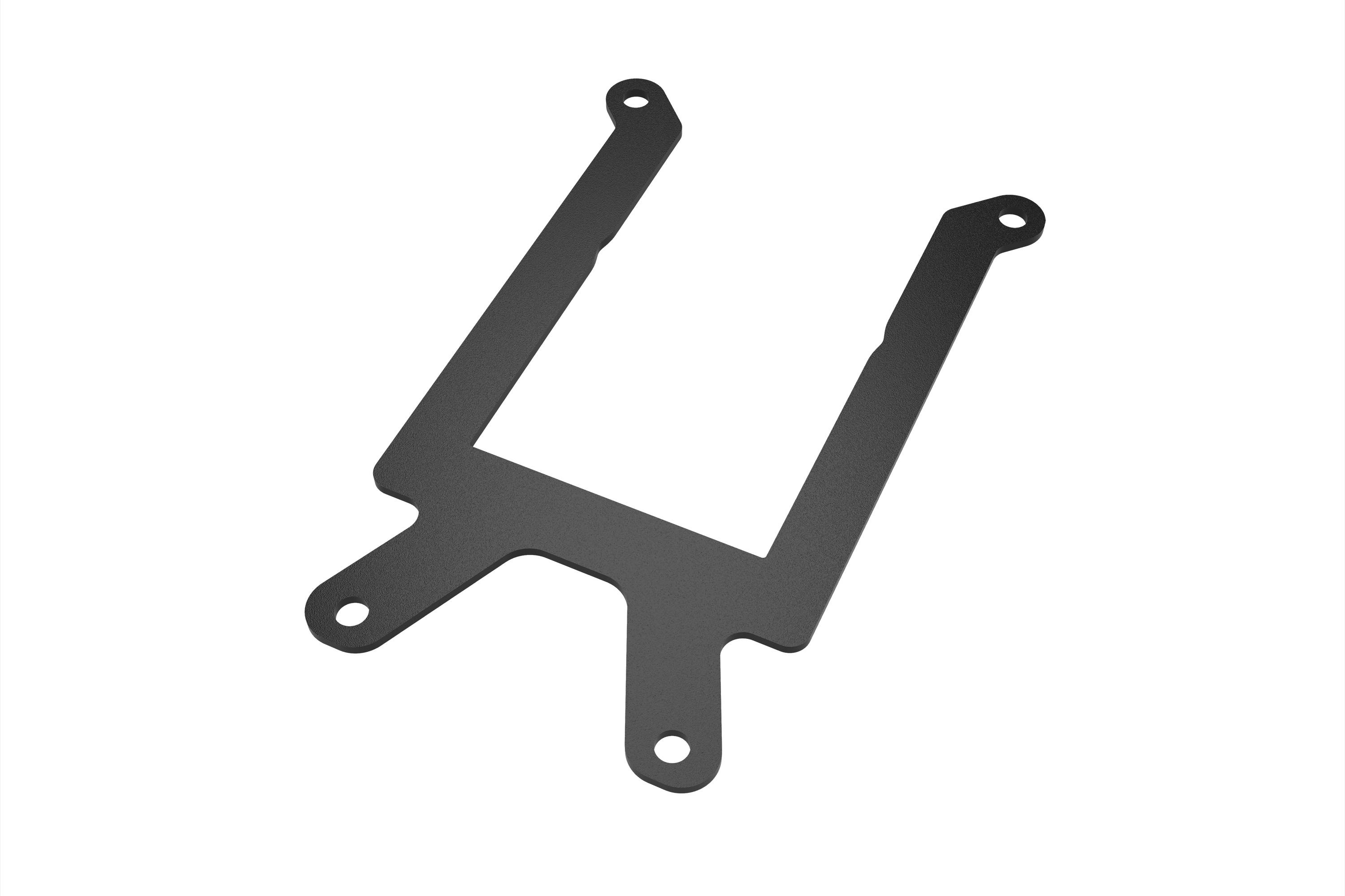 Czarny prostokątny element metalowy z czterema zaokrąglonymi otworami mocującymi w narożnikach, prawdopodobnie element montażowy.