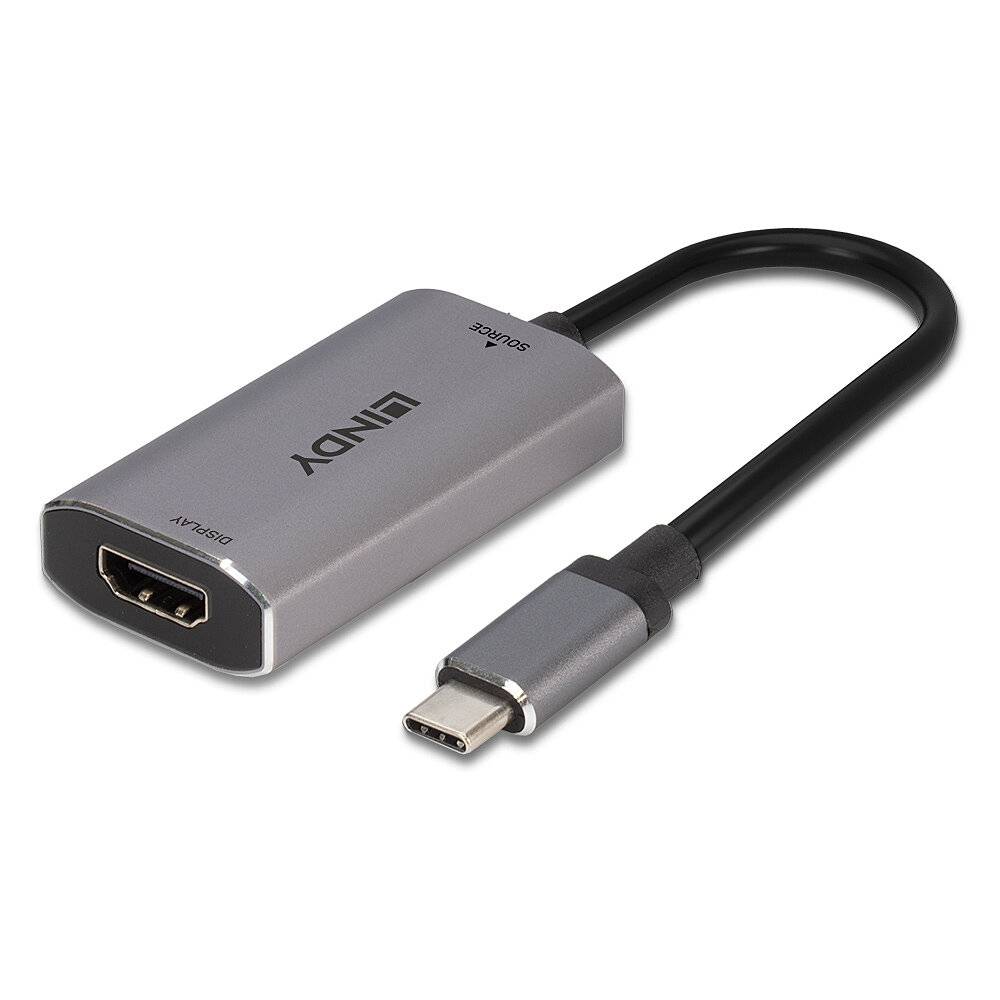 Srebrno-szary adapter z gniazdem HDMI po jednej stronie i wtyczką USB-C po drugiej stronie, służący do łączenia urządzeń elektronicznych.